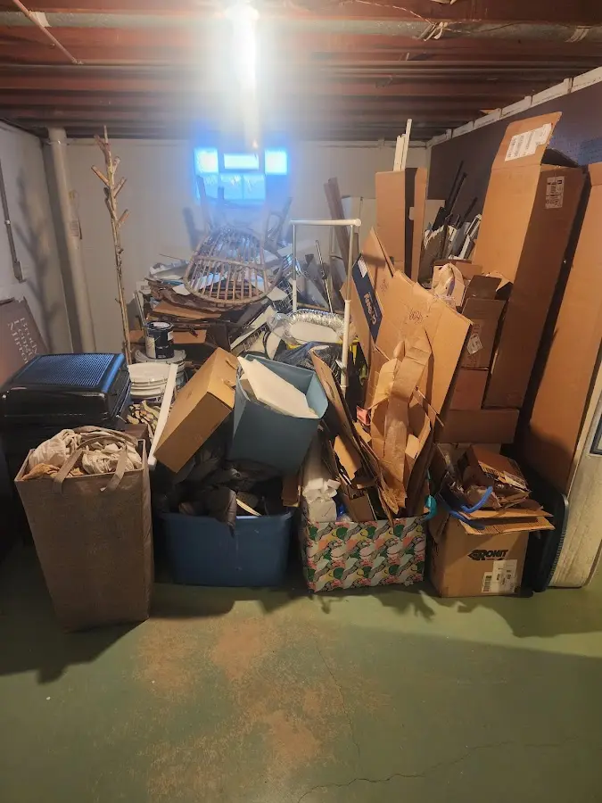 Roll-off dumpster container at job site for 8 Yard Dumpster Rental in Brooklyn